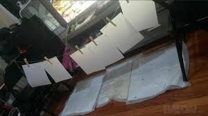 A4 sheet infused with liquid K2 on a table